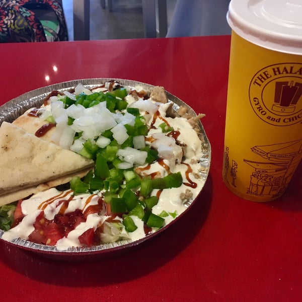 Photo taken at The Halal Guys by Christopher P. on 10/24/2017