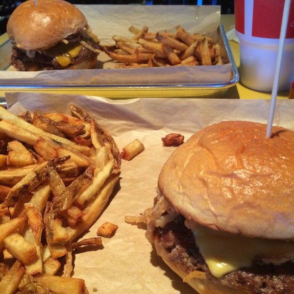 Photo taken at MOOYAH Burgers, Fries &amp; Shakes by Stephanie O. on 4/19/2015