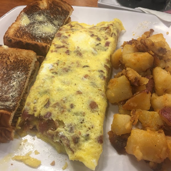 Photo taken at Eggs Up Grill by John B. on 12/21/2018