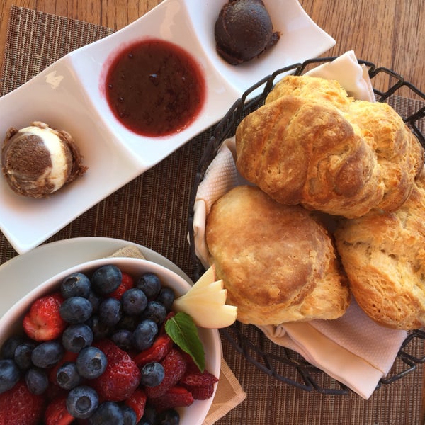 Brunch: Fresh Fruit ($5) and Buttermilk biscuits with "Nutella", cinnamon butter and jam ($7)