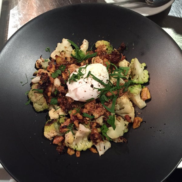 Cauliflower with poached egg, walnuts and caramelized onion brunch dish is excellent