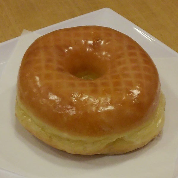Снимок сделан в Baker&#39;s Dozen Donuts - Deli &amp; Delights пользователем Bakers D. 4/10/2015