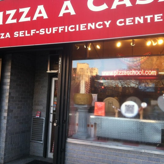 Photo taken at Pizza School NYC by Jonathan V. on 1/26/2013
