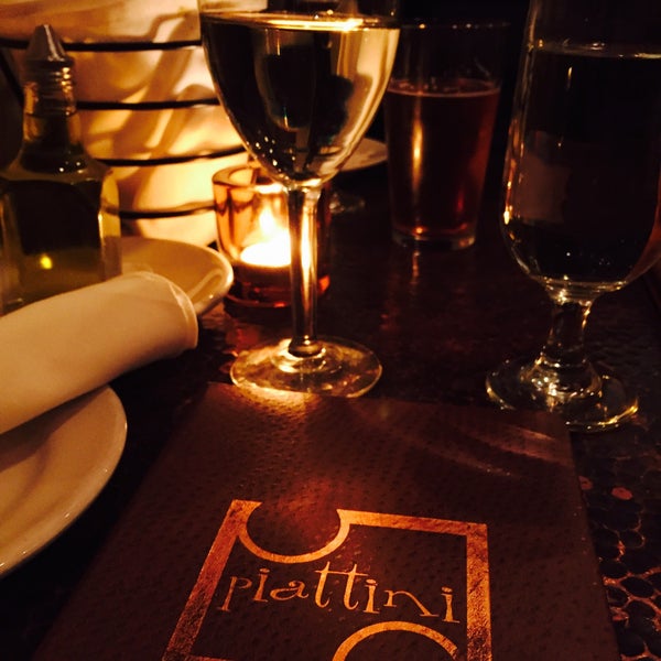 Foto diambil di Piattini Wine Cafe oleh aerivas pada 9/26/2015