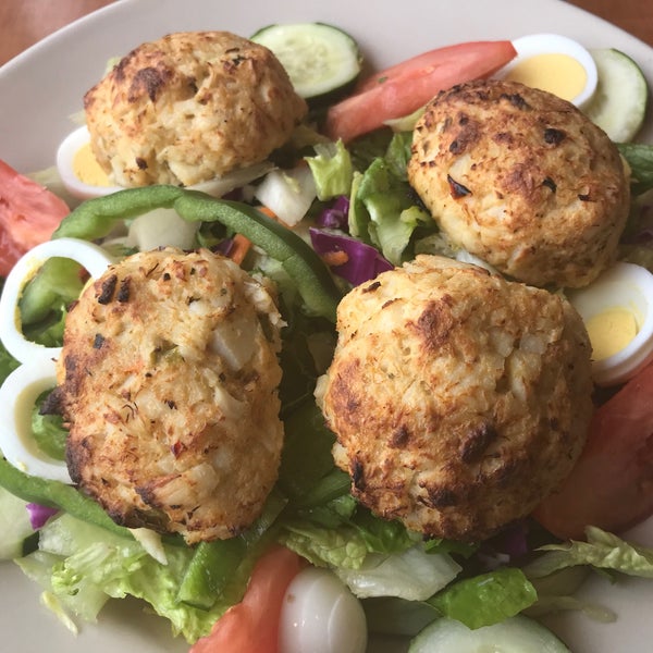 Get the crab cakes , very delicious