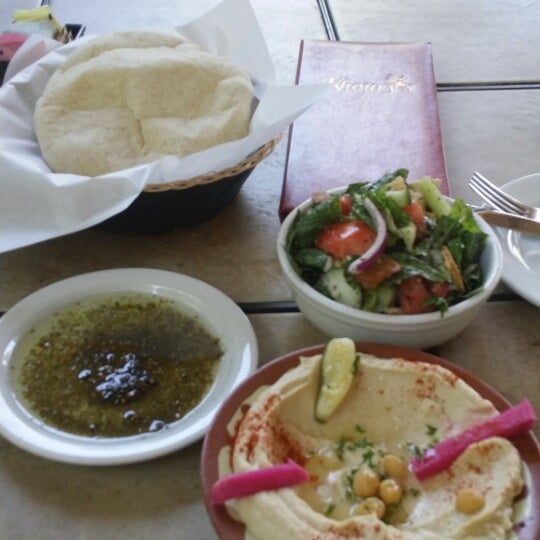 Photo taken at Khoury&#39;s Mediterranean Restaurant by Chef E. on 6/24/2014