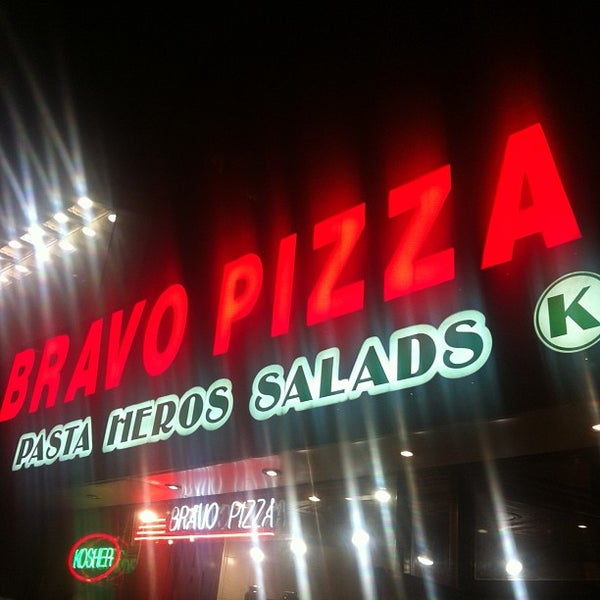 Photo taken at Bravo Pizza by Shay on 4/7/2013