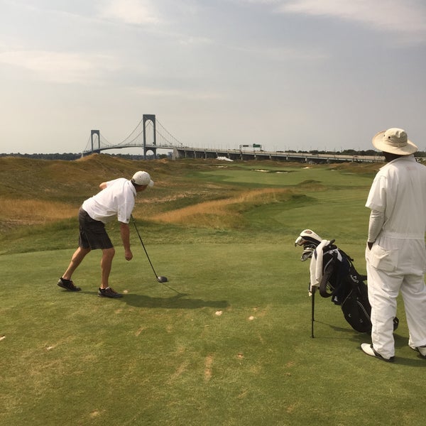 Photo taken at Trump Golf Links at Ferry Point by James Y. on 7/26/2015