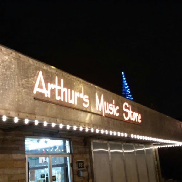 Photo taken at Arthur&#39;s Music Store by Alicia A. on 12/18/2014