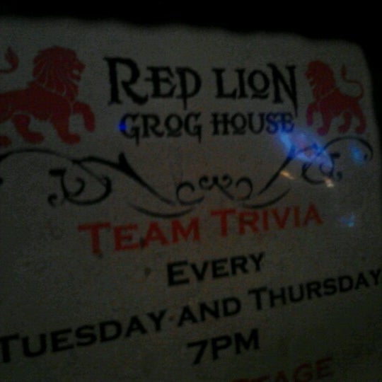 Photo taken at Red Lion Grog House by Alicia A. on 3/21/2013