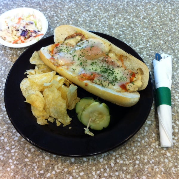 CAFE LUNCH SPECIAL: Chicken Cheese Steak (Grilled Chicken, Peppers, Onions, Marinara Sauce, Melted Provolone on a Stake Roll) Served with Chips and Cole Slaw $6.95