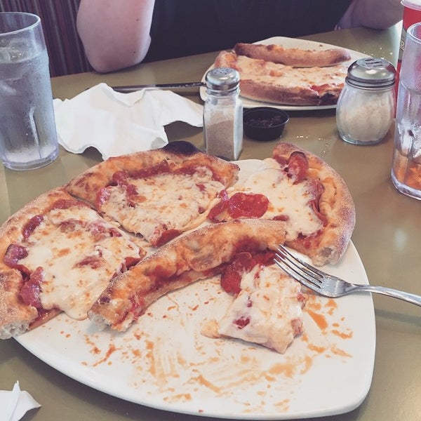 Photo taken at Flippers Pizzeria by Sam S. on 3/26/2015