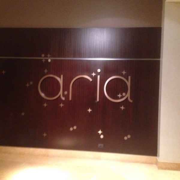 Photo taken at Aria Restaurant and Bar by Christopher V. on 8/4/2013