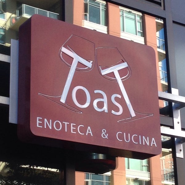Photo taken at Toast Enoteca &amp; Cucina by Christopher V. on 12/22/2014