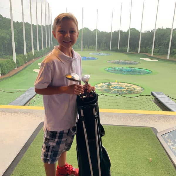 Photo taken at Topgolf by Emily D. on 6/19/2019