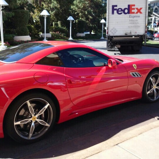 Photo taken at Ferrari Maserati Showroom and Dealership by JoN on 10/6/2014