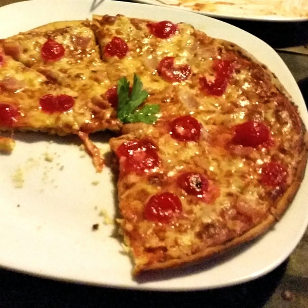 Pizza con cereza y tocino  deliciosa y con promoción casi a mitad de precio
