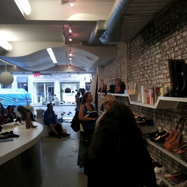 Photo taken at MooShoes NYC by Adrienne B. on 8/22/2013