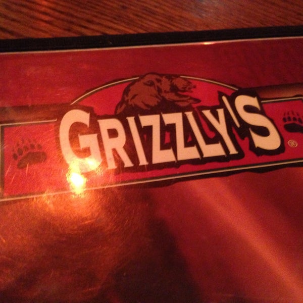 Photo taken at Grizzly&#39;s Wood-Fired Grill &amp; Steaks by Jon A. on 5/9/2013