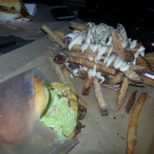 Photo taken at BurgerFi by Anthony H. on 10/11/2012