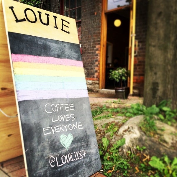 Photo taken at Louie Coffee Shop by Ben L. on 6/25/2014