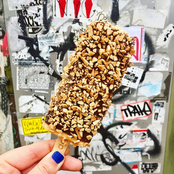 Get the dulce de leche popsicle with chocolate dip and waffle cone bits.