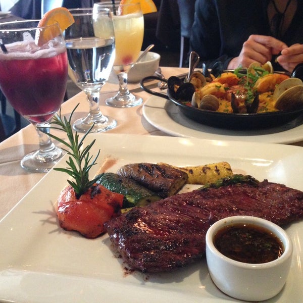 Photo taken at Ushuaia Argentinean Steakhouse by Nina B. on 5/3/2014
