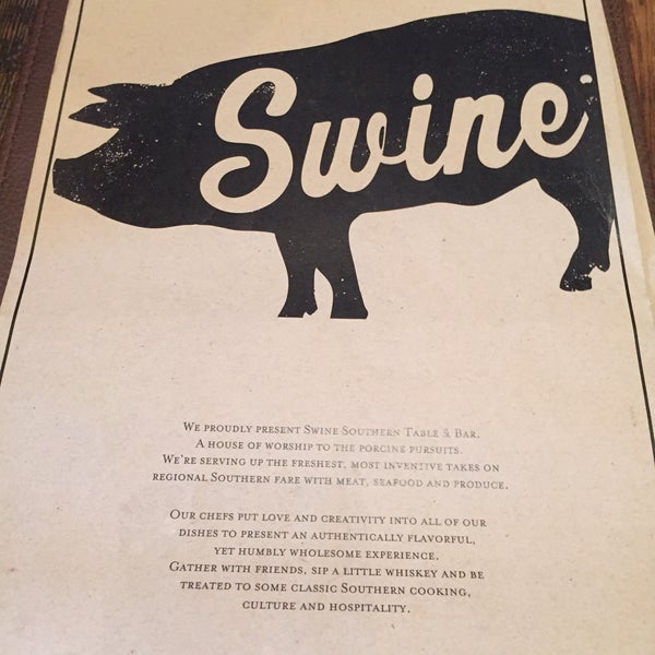 Photo taken at Swine Southern Table &amp; Bar by Gustavo F. on 12/12/2015