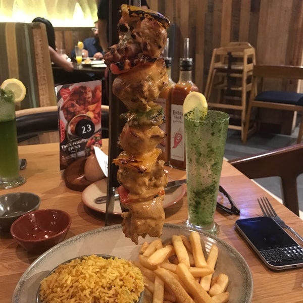 Photo taken at Nando&#39;s The Greens by F. on 8/10/2017