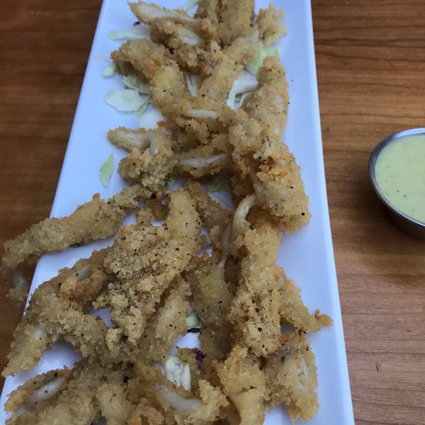 Photo taken at Seasons &amp; Regions Seafood Grill by Ken R. on 3/21/2019