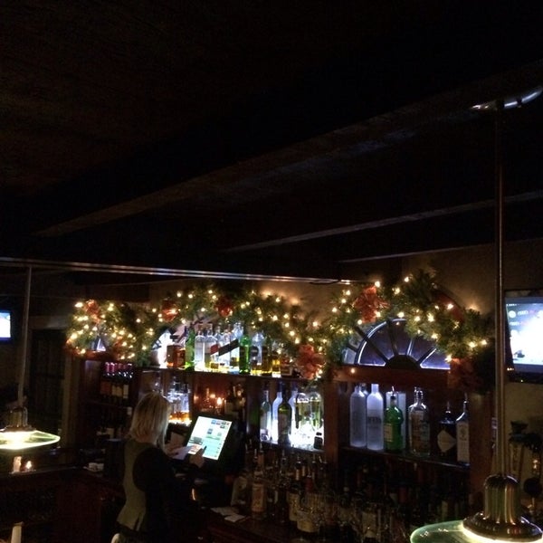 Photo taken at Andiamo Restaurant + Bar by Evan K. on 1/1/2014