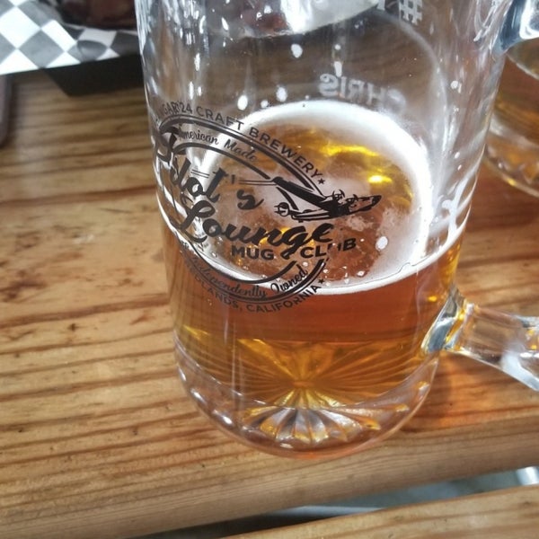 Photo taken at Hangar 24 Craft Brewery by Chris M. on 5/26/2019