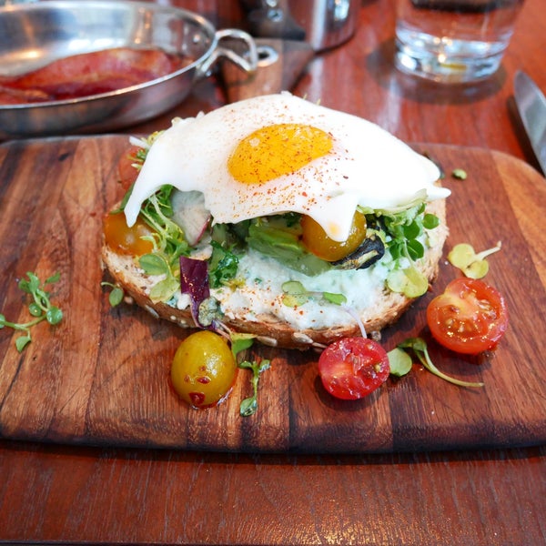 Get the avocado toast with the egg sunny side up, it will turn your cloudy morning sunny side up! 😋