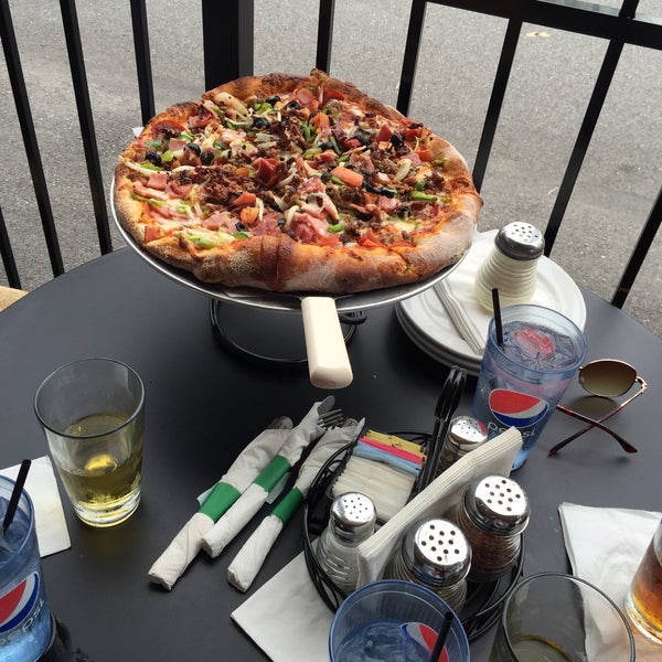 Photo taken at Home D Pizzeria &amp; Robin Hood Brewing Co. by Silvia A. on 7/2/2015