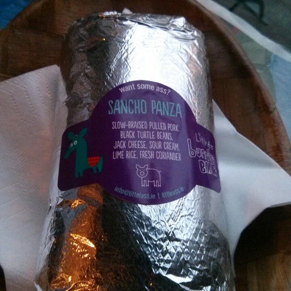 Delicious pork burrito. Get with avocado and mango salsa !