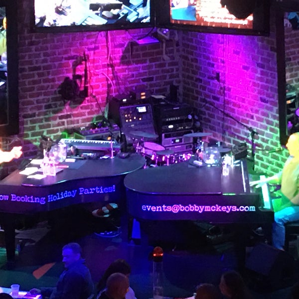 Photo taken at Bobby McKey&#39;s Dueling Piano Bar by Warren O. on 11/17/2019