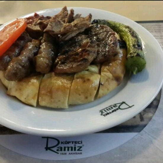Photo taken at Köfteci Ramiz Plus by Şükrü B. on 5/31/2014