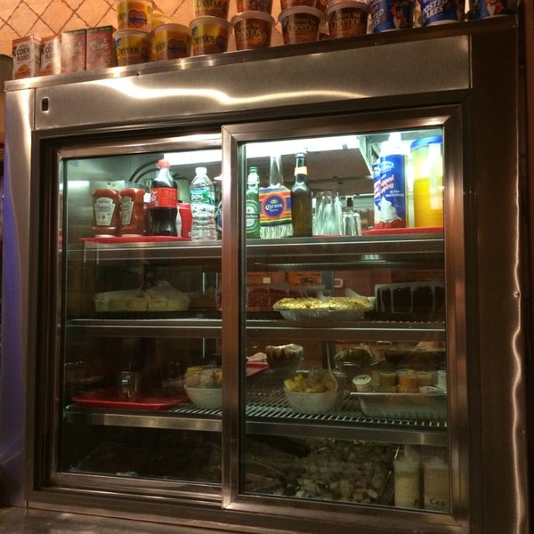 Photo taken at Sunset Park Diner &amp; Donuts by Manuel B. on 6/7/2014