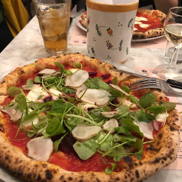 Photo taken at NONA Pizza by El on 4/1/2019