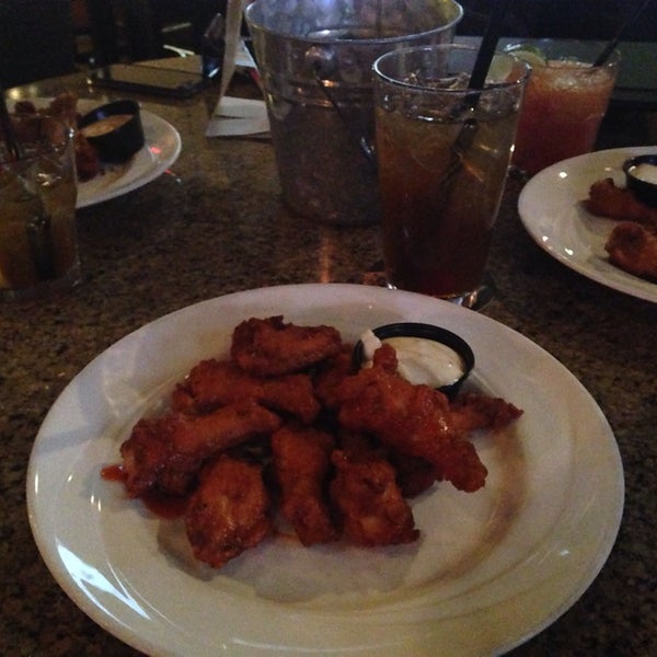 Photo taken at Wings Tap &amp; Grill by Carla on 3/2/2014