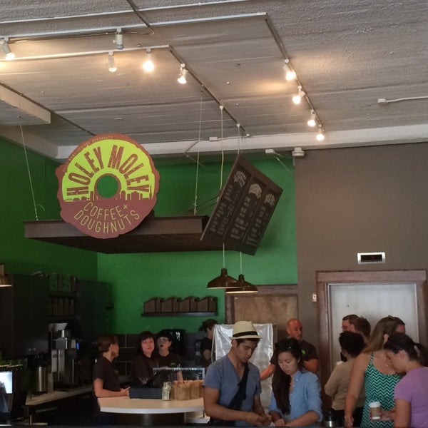 Photo taken at Holey Moley Coffee + Doughnuts by Toni S. on 7/19/2014