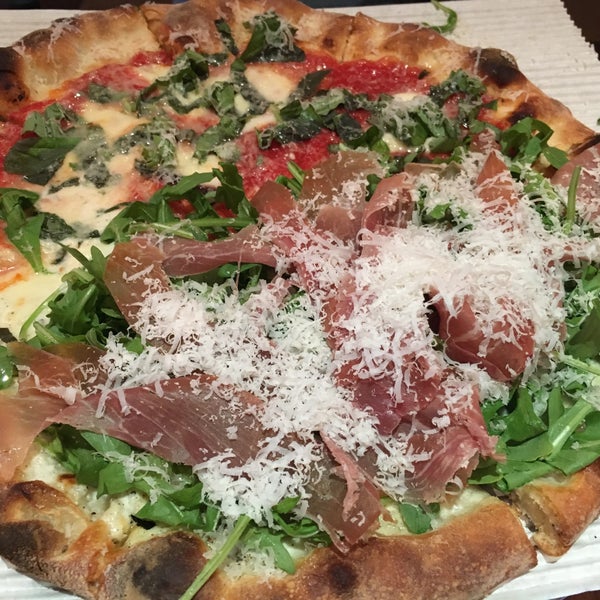 Photo taken at Howie&#39;s Artisan Pizza by Junko I. on 10/3/2015