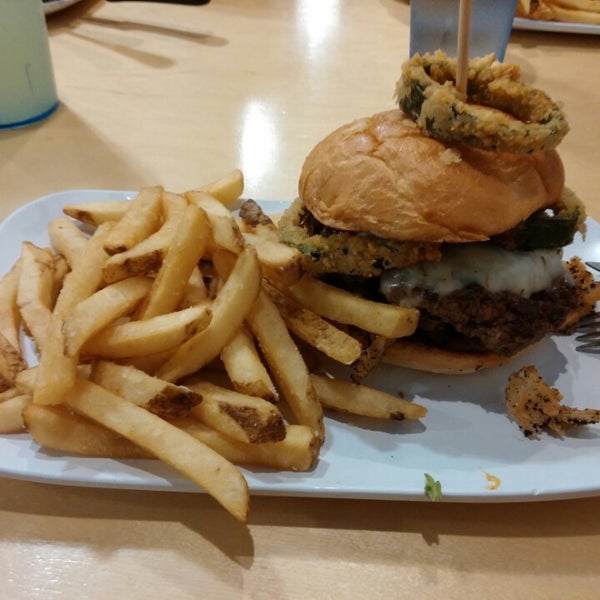 Photo taken at Crave Real Burgers by Darren on 8/2/2014