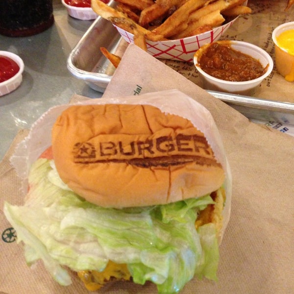 Photo taken at BurgerFi by Justin Z. on 6/14/2013