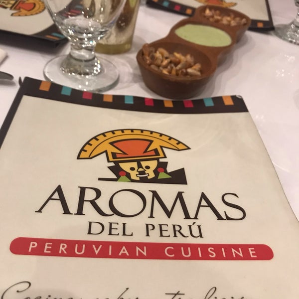 Photo taken at Aromas del Peru Restaurant by Carmen M. on 3/16/2019
