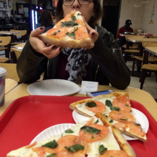 Photo taken at Ray&#39;s Famous Original Pizza by André D. on 12/22/2013