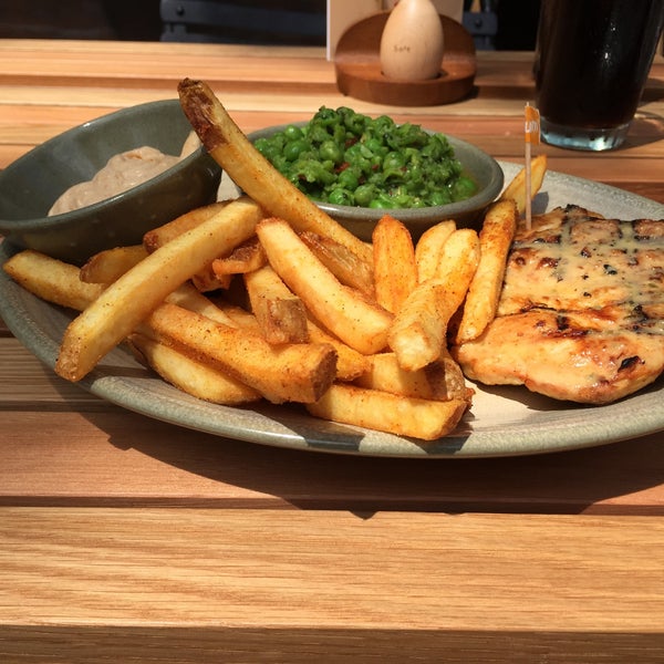Photo taken at Nando&#39;s by Kevin C. on 6/21/2015