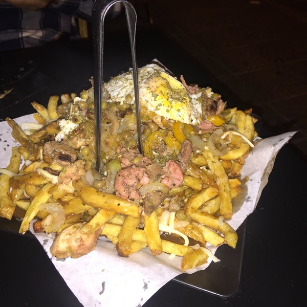 Photo taken at Canuck&#39;s Poutinerie by Allan S. on 11/17/2016