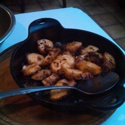Pulpo a LA pancha! It is a law you gotta order this at a Spanish restaurant! They serve it in a sizzling iron pan!