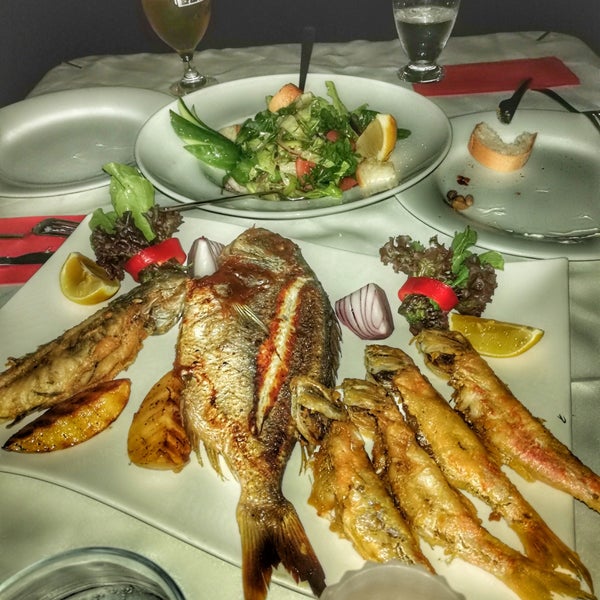 Photo taken at Tymnos Restaurant by Hülya E. on 9/13/2018